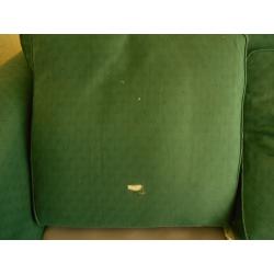 Green cotton sofa, free. Worn but serviceable. Feather cushions. Buyer to collect