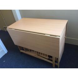 Folding/gateleg table with chair storage