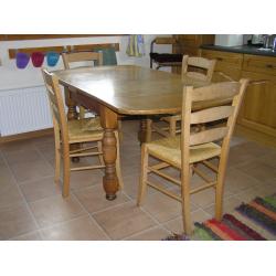 oak draw-leaf table, extends from 110 to 170cm. lovely legs! Very solid, top removes for transport