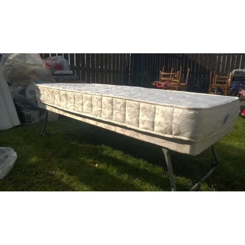 Small single foldable bed with matress like new