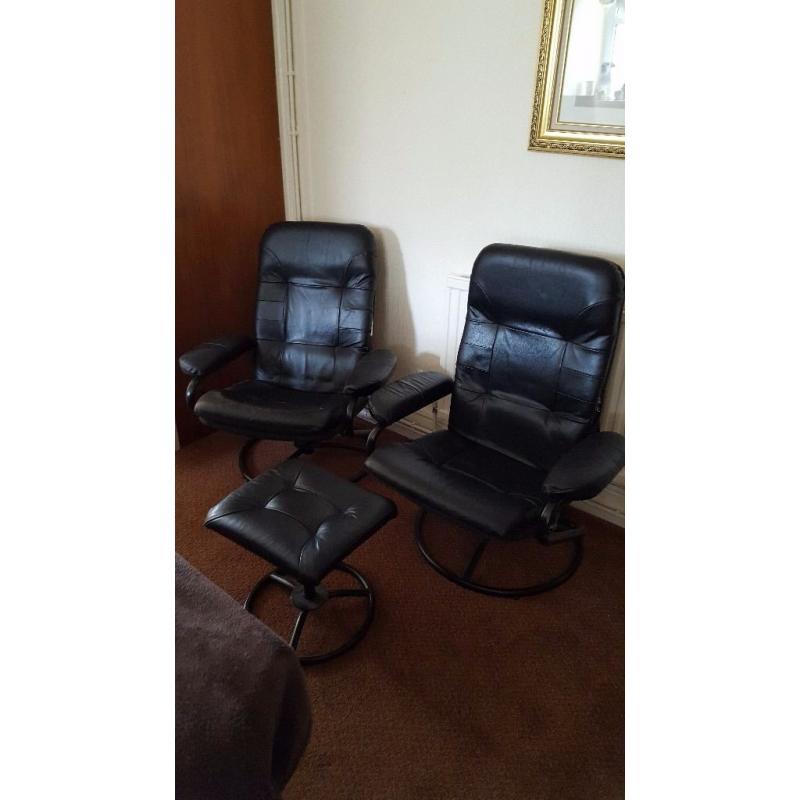 Pair of leather easy chairs with matching footstool. Needs a little tlc.