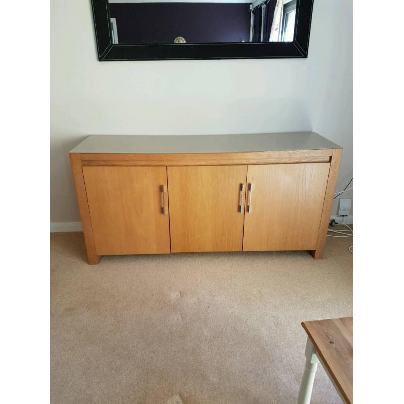 Lovely large oak veneer sideboard with smoked taupe coloured glass top