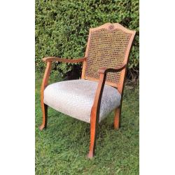 Antique caned chair, newly upholstered and restored