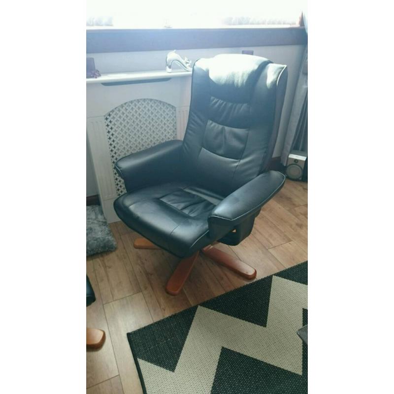 Black faux leather reclining chair