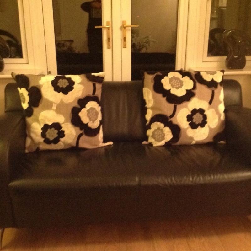 Large 2 and 3 seater Black leather sofas with chrome feet