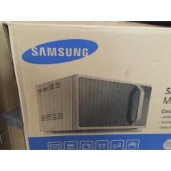 Brand new Samsung microwave. Still in box. Now half price.