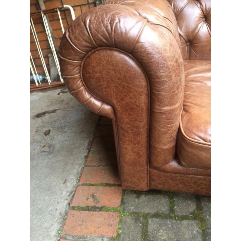 Stunning distressed look leather Chesterfield chair