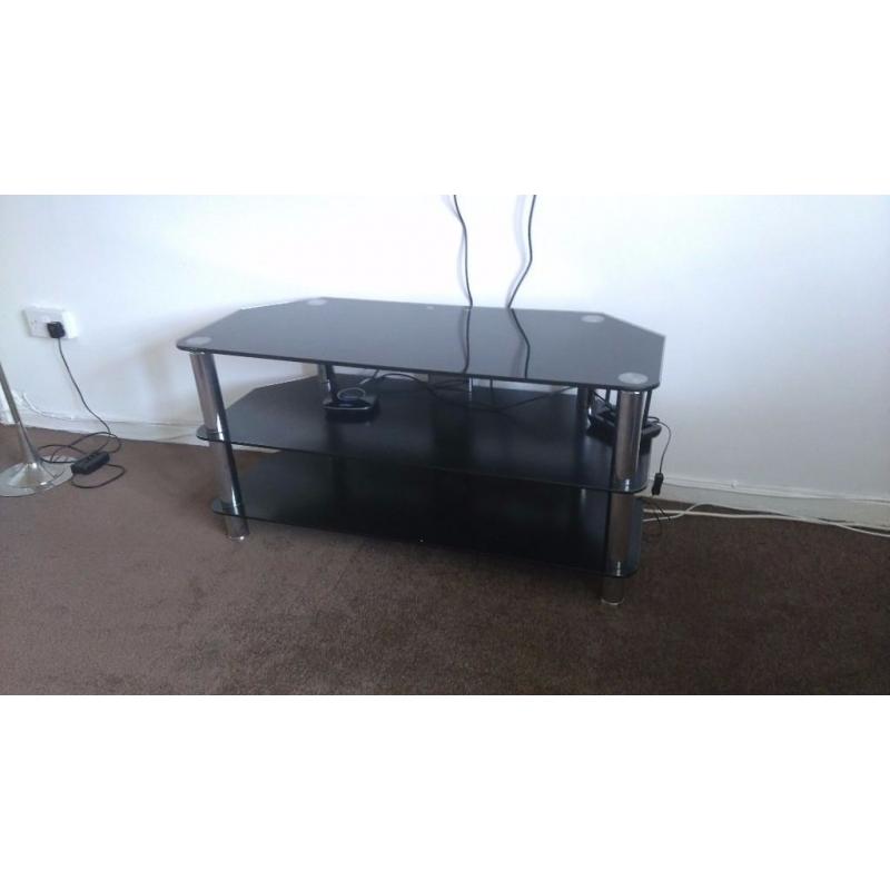 Black glass and chrome legged tv stand