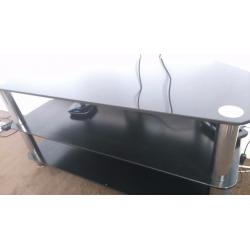 Black glass and chrome legged tv stand