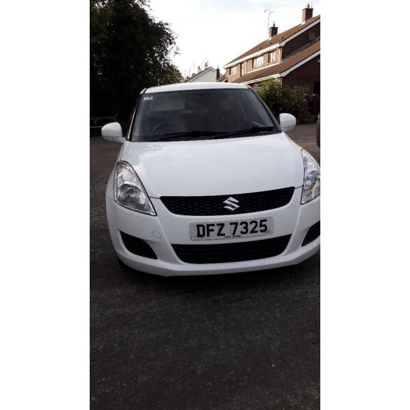 White 2010 suzuki swift for sale