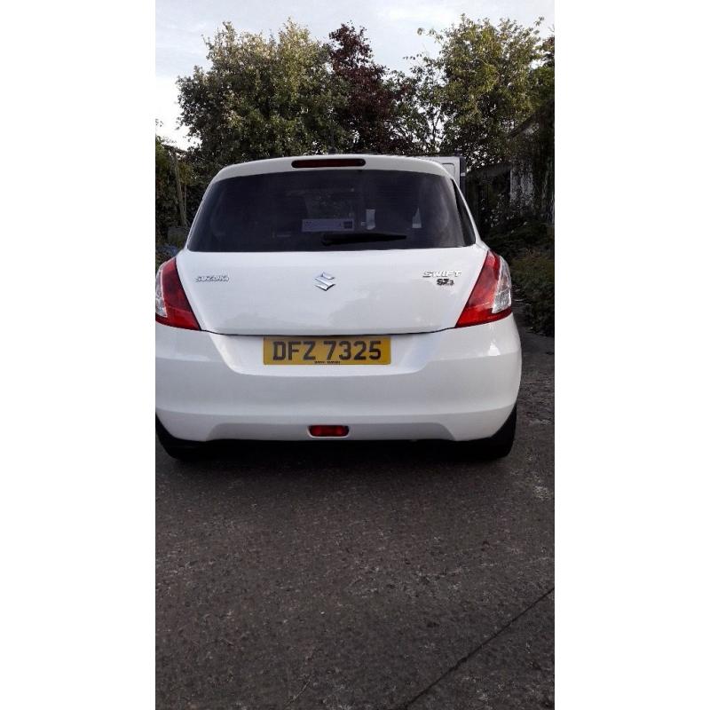 White 2010 suzuki swift for sale